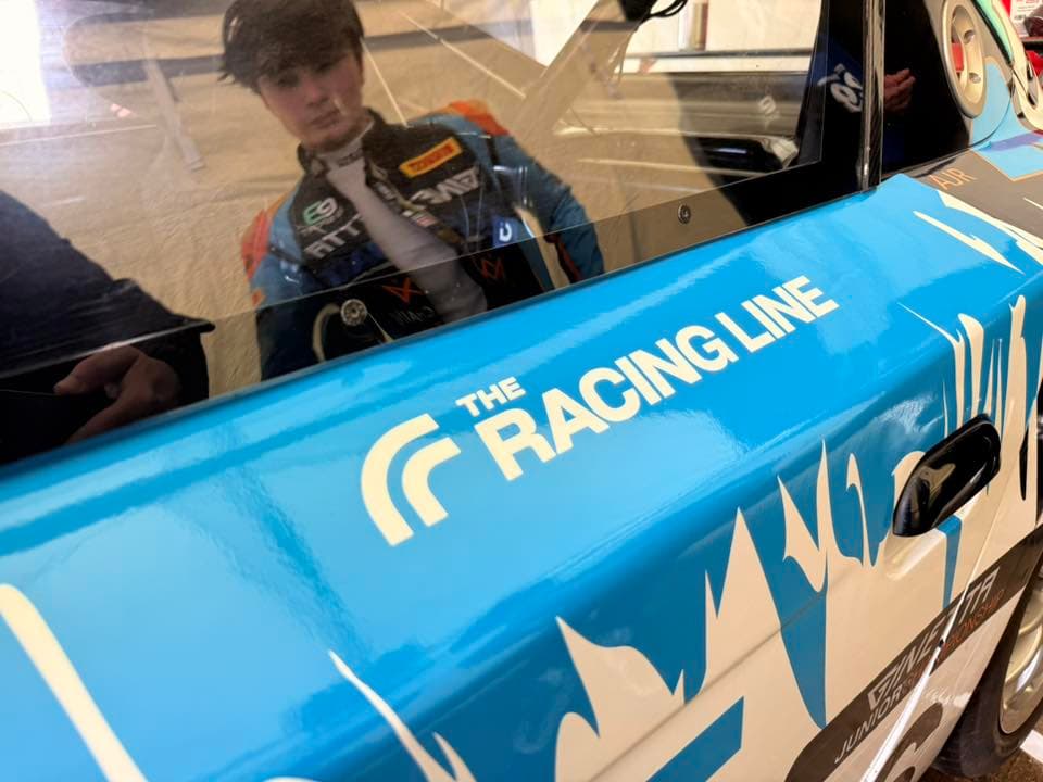 The Racing Line sticker on a race car 6