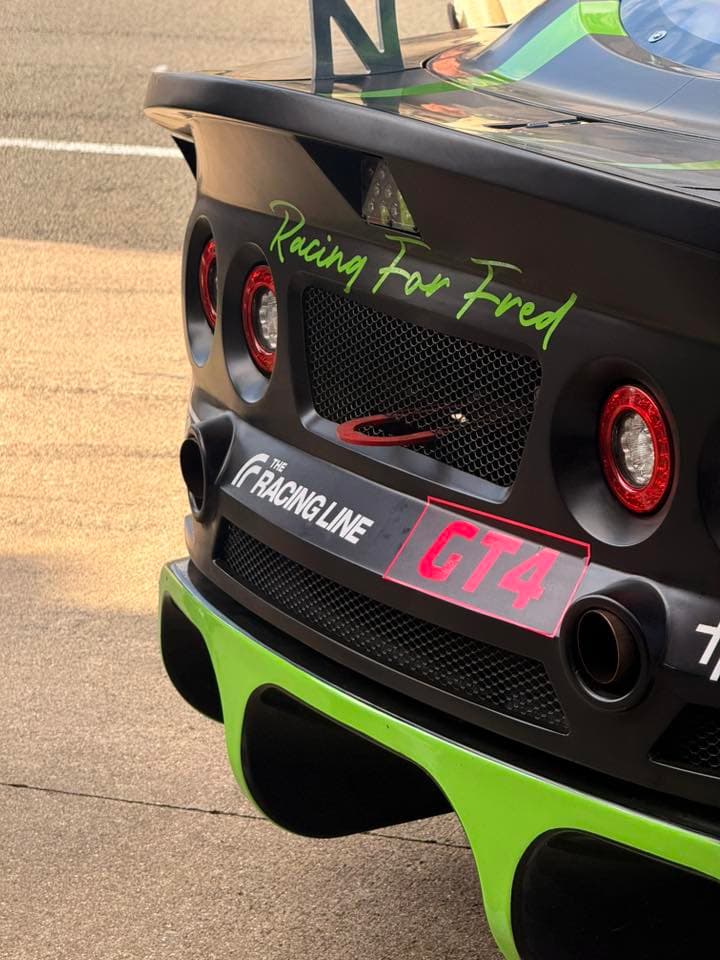 The Racing Line sticker on a race car 3