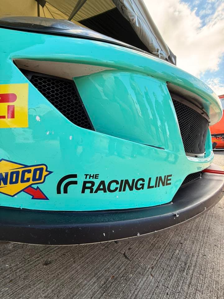 The Racing Line sticker on a race car 4