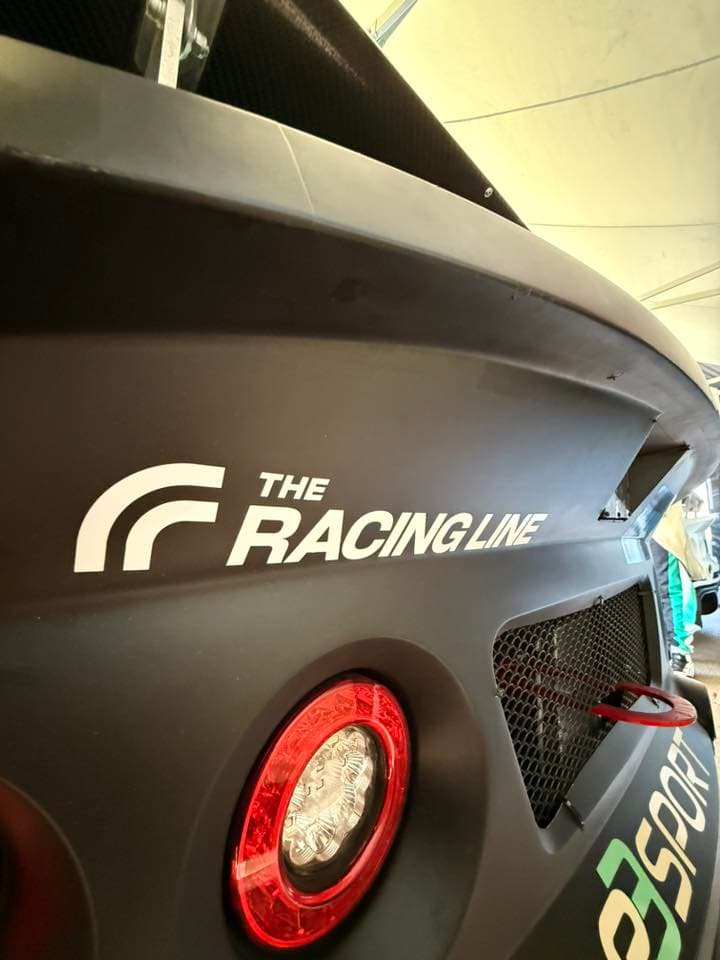 The Racing Line sticker on a race car 5
